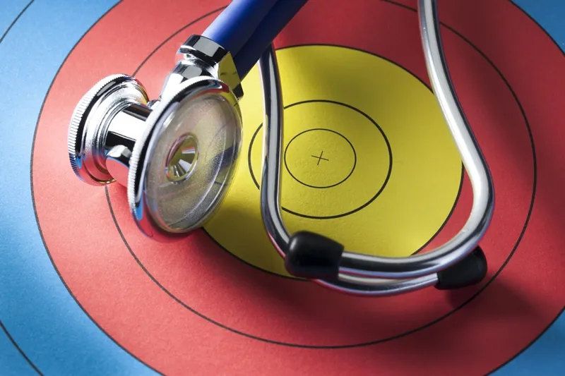 stethoscope placed on a colorful  target