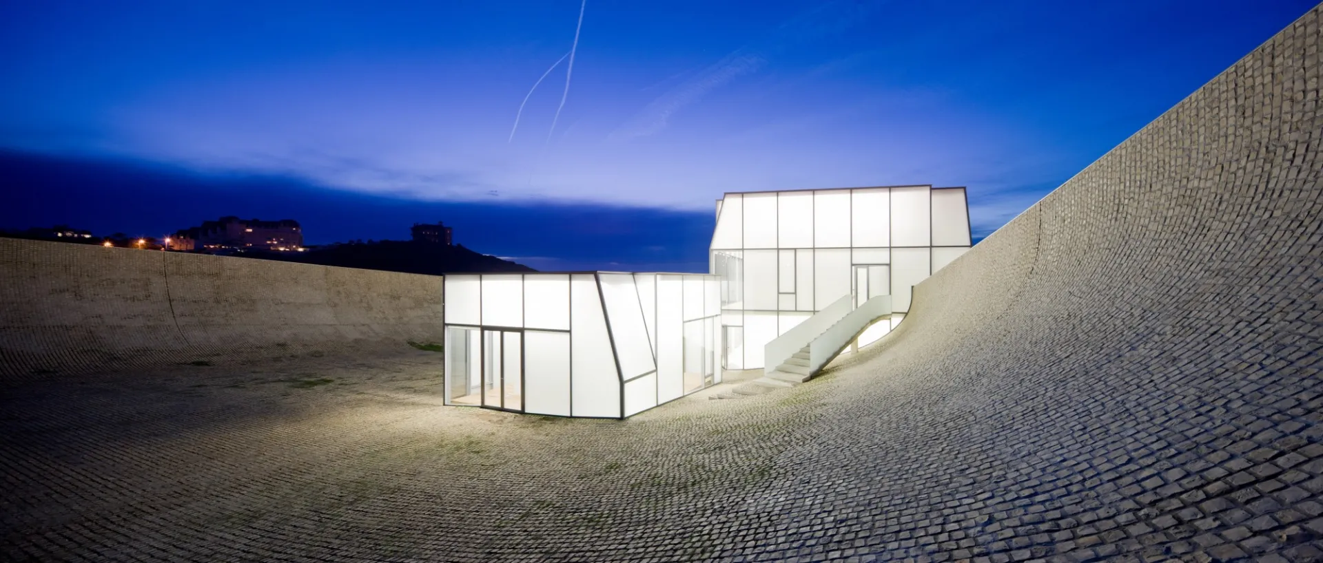 Image of glass house in a canyon.